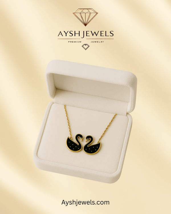 Double swan pendant